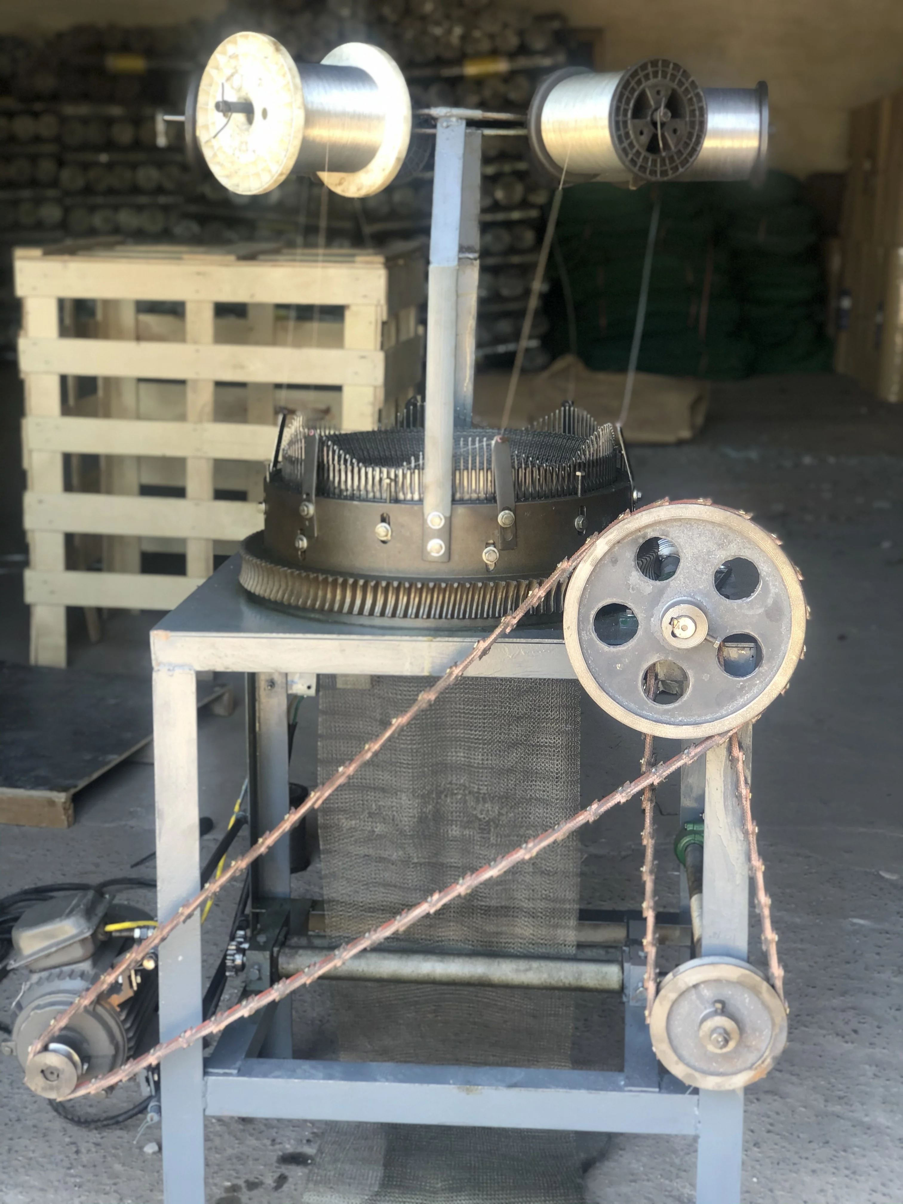 Circular knitting machine for EMI shielding steel wire knitted machine