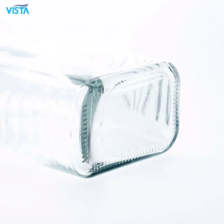 650ml Clear Transparent Queenline Honey Glass Jar Lines Embossment Flat Jar For Food Storage With 63mm Screw Lid