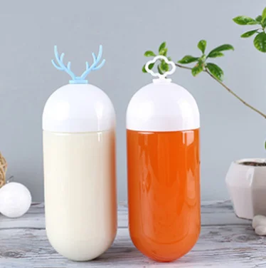 Creative deer antler capsule bottle transparent disposable PET milk tea bottle take out drink with lid net red plastic bottle (1600583756585)