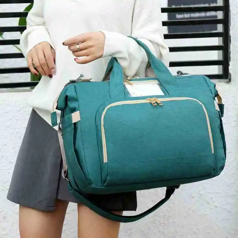 Factory outlet baby diapers waterproof breathable wear resistant multi function mommy diaper bag with change diaper station