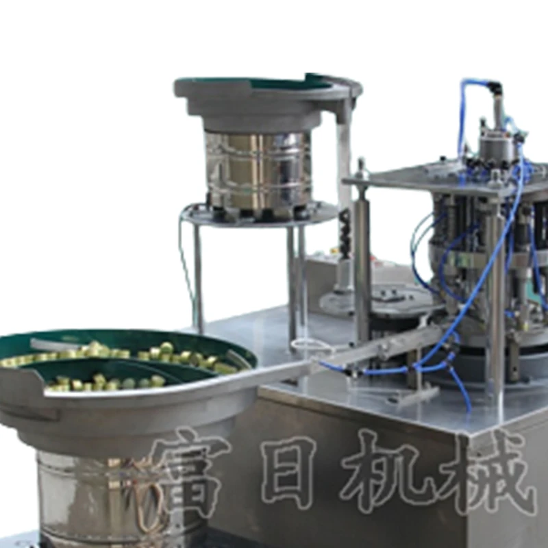 Automatic rubber and aluminum cap assembly machine