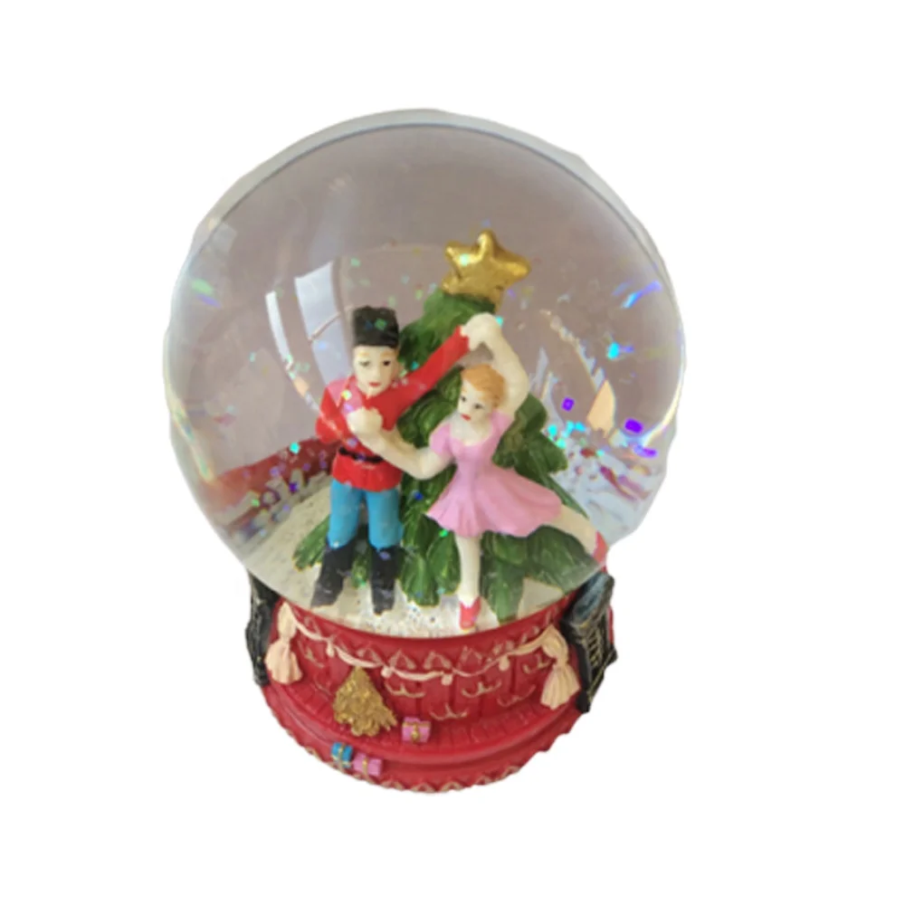 Water globe souvenir wedding dancing couple snow globe
