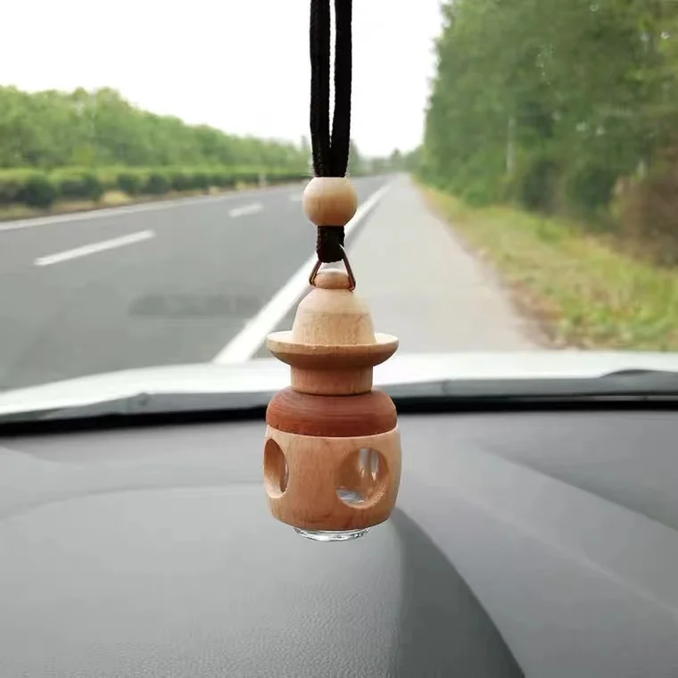 Factory wholesale high end cleardoll shaped empty car air freshener perfume glass bottle with wooden top
