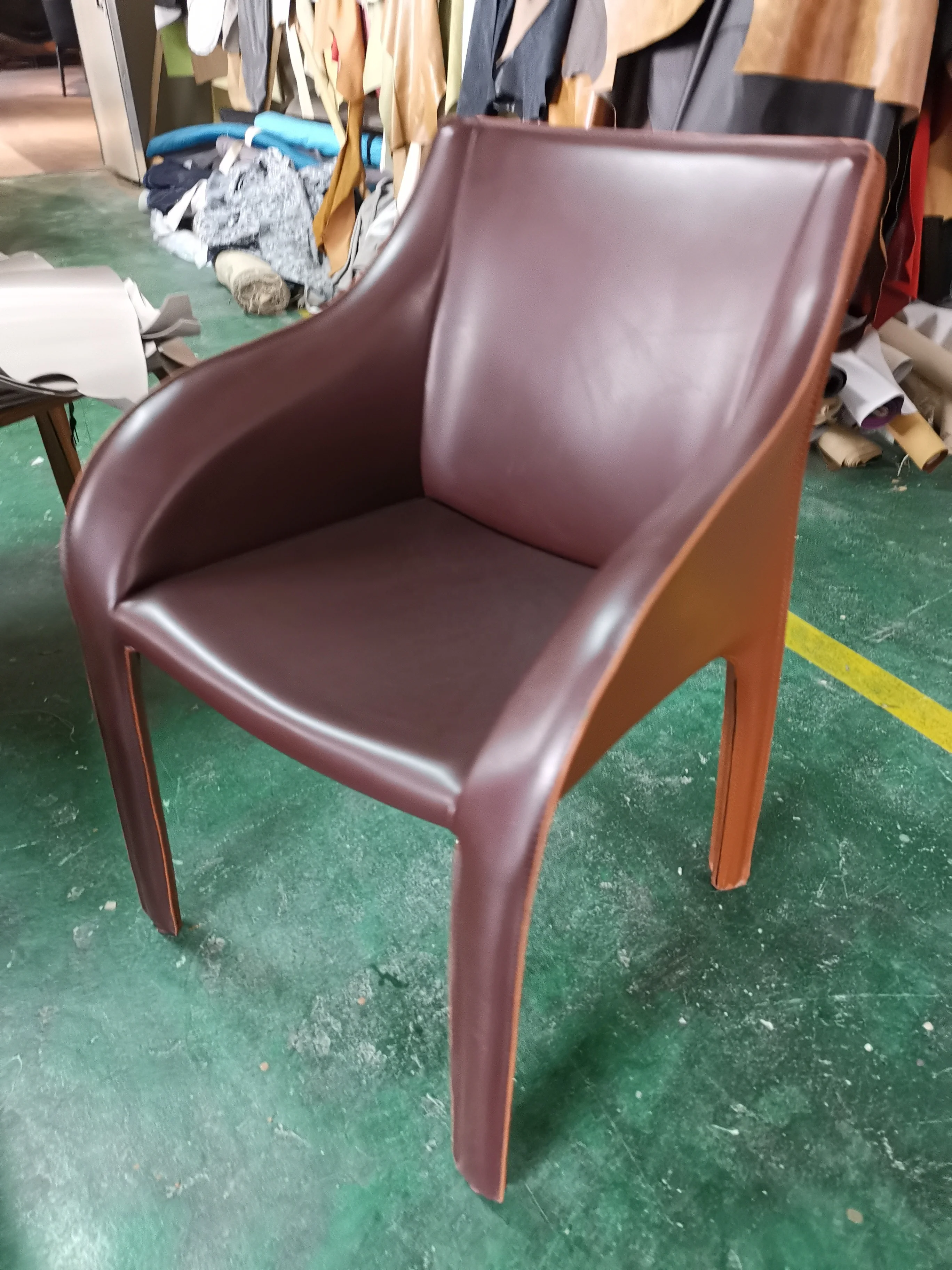 Modern simple dining room chair household dining chair personality fashion Nordic Italian saddle leather leisure chair back