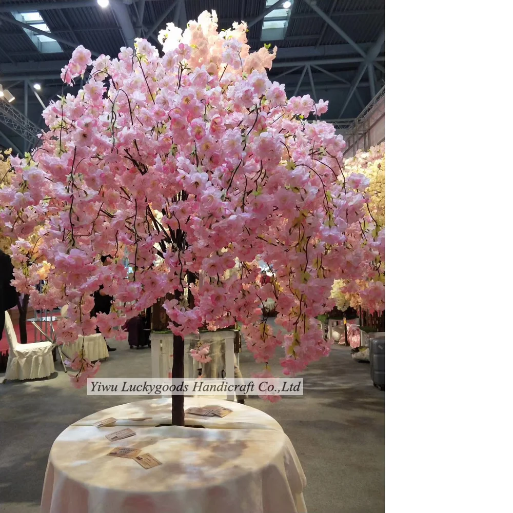 White wedding flowers with crystal stand for wedding table centerpiece