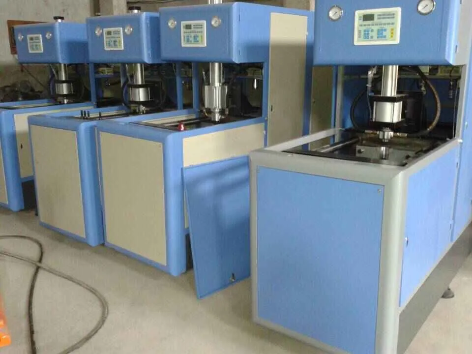 
4 cavity Semi automatic PET bottle blowing machine price 