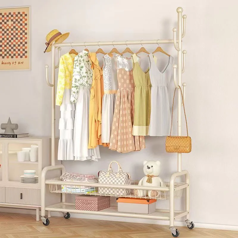 Metal gold home luxury independent rolling clothing hanger with storage basket