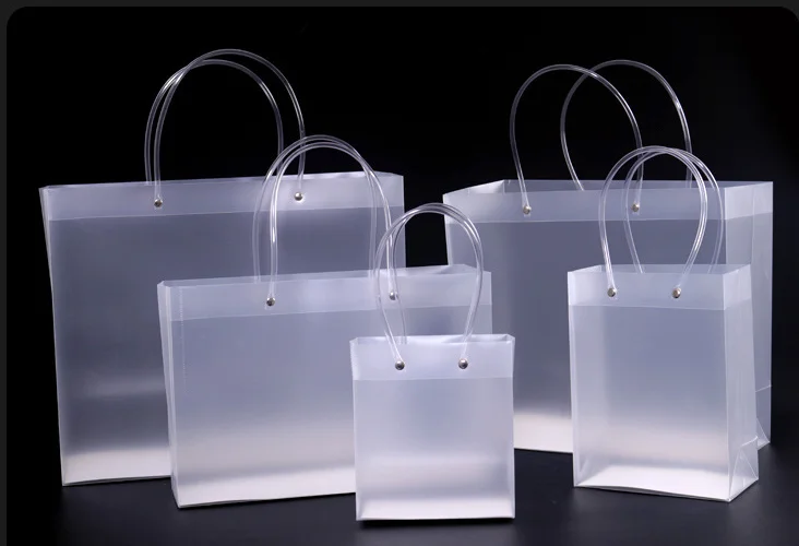 Eco-friendly wholesale transparent pvc handle shopping packaging gift bags