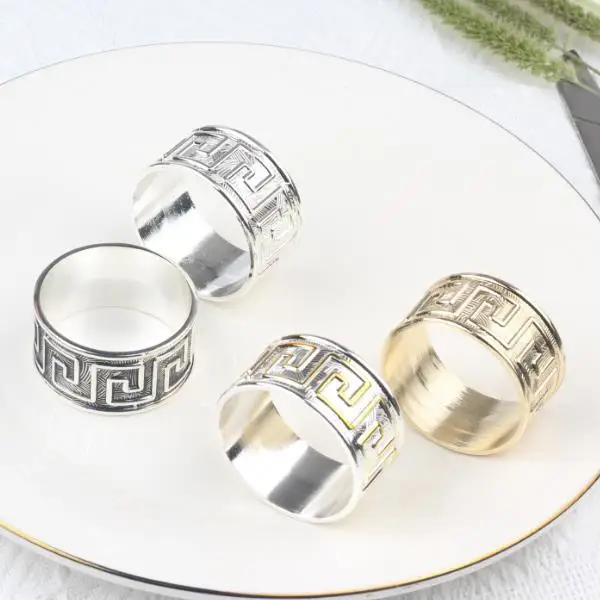 Manufacturers wholesale wedding napkin buckle round back word pattern smear hotel napkin ring high-end restaurant napkin ring