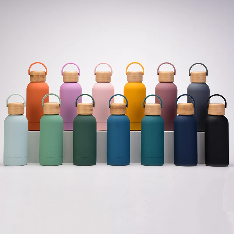 2023 New Design Stainless Steel Bamboo Lid Thermal Bottles Outdoor Sports Picnic Fitness Thermal Water Bottle