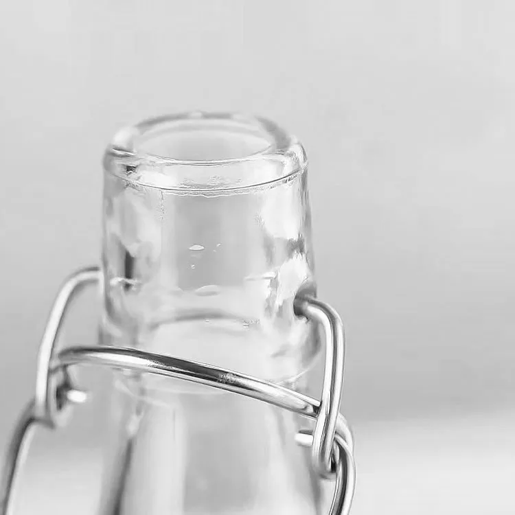 Оптовая продажа 1 литр 33 fl. Oz. Нажмите на изображение для просмотра в полный размер Флип-Топ стеклянная бутылка 60 мл с вертящимся верхом Пивоваренная фиксаторы уход за кожей лица маска напитков