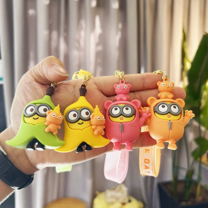 New creative cartoon cross dressing hoodie small yellow keychain PVC rubber pendant doll student backpack pendant accessories