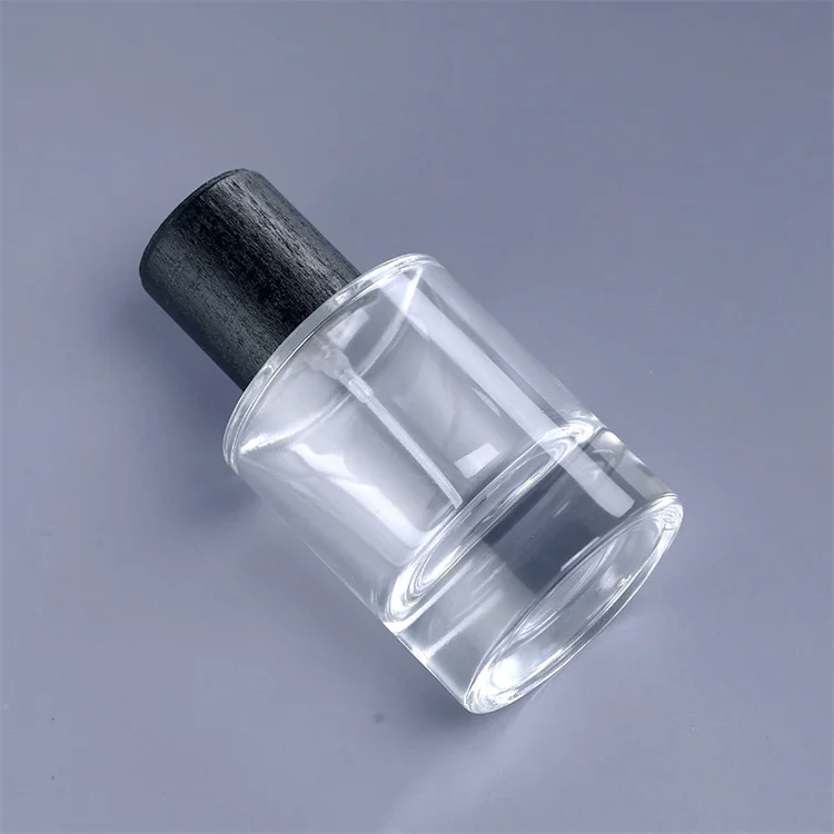 cheap magnetic lids 30ml 33ml 35ml cylinder glass perfume packaging bottle high gloss black with magnet cap india