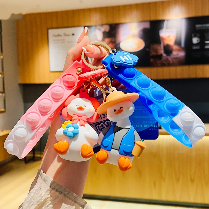 Host sell adorable Animation Comic Duckling Bracelet Wearable Push Poping bubble bracelet Duck Fidget Toy Keychain