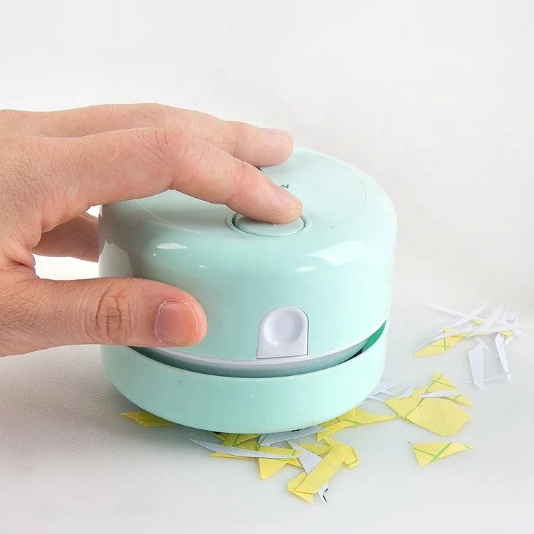 Battery operated handy home office school desk dust portable mini vacuum cleaner