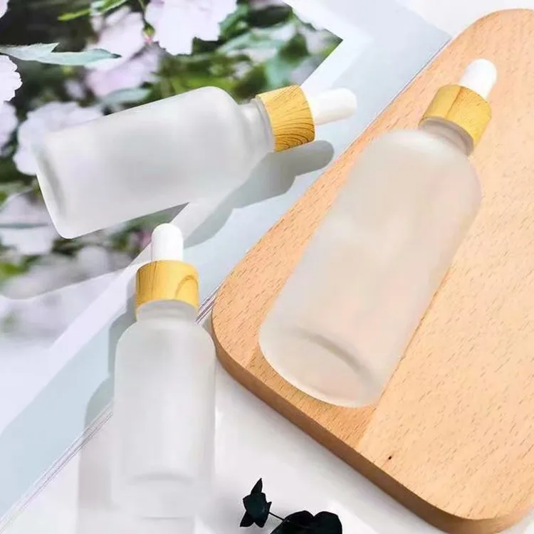 Glass oil dropper and spray mat black frosted amber glass bottle with bamboo spray pump 30 ml dropper cosmetic