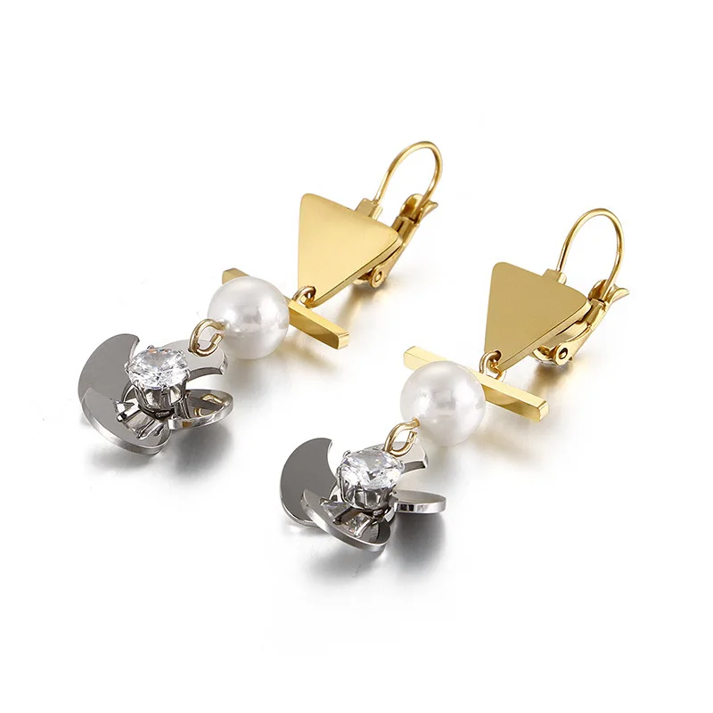 
Retro baroque court wind contracted geometry pearl rotary windmill earrings wholesale 