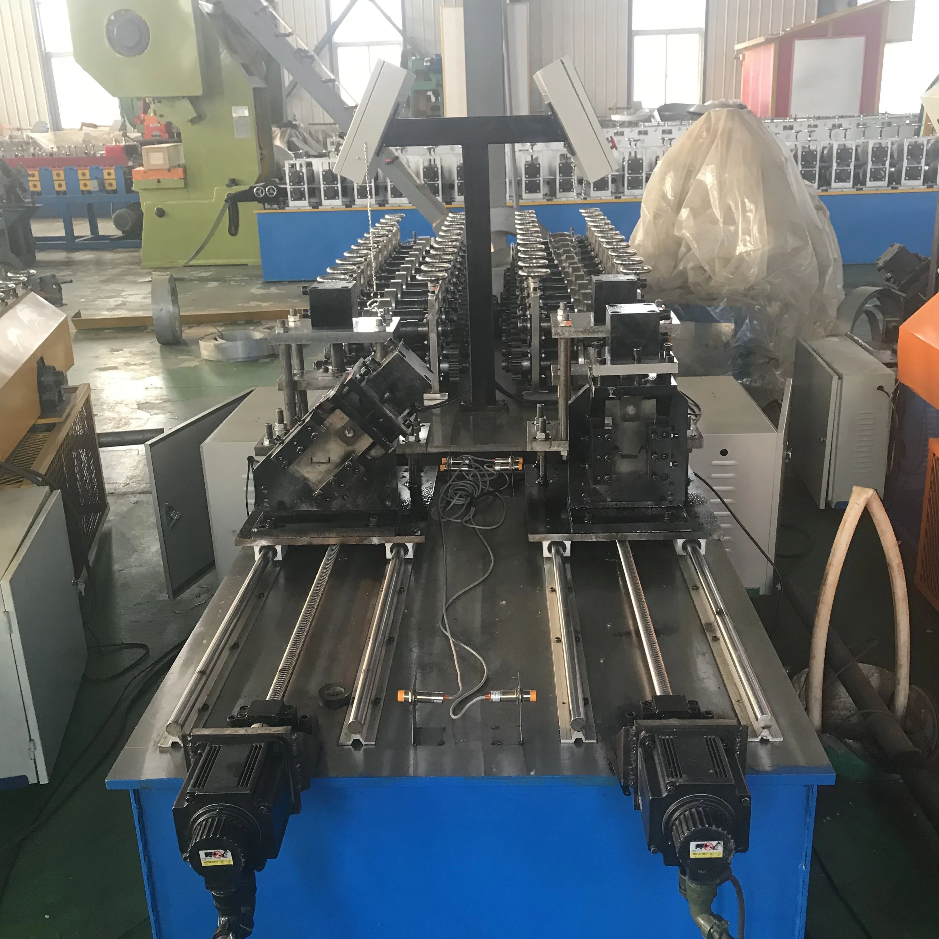 Hot Selling Double Line C U Light Steel Framing Metal Stud and Track Roll Forming Machine Price