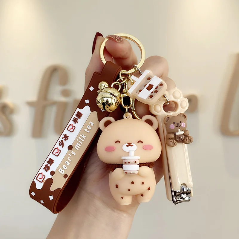 Creative Milk Bottle Crystal Milk Keychain Cute Hairy Ball Flowing Liquid Key Chain Milk Tea Bear Floating Liquid Keyring