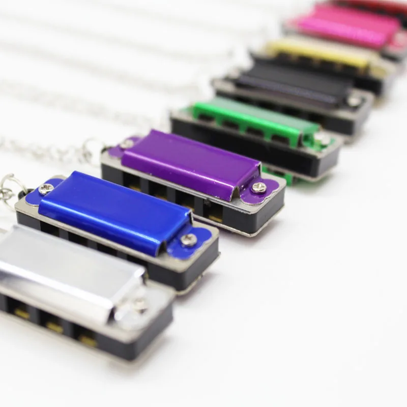 Wholesale custom logo hot selling stainless steel  4 hole 8 tone harmonica with opp  bag packing