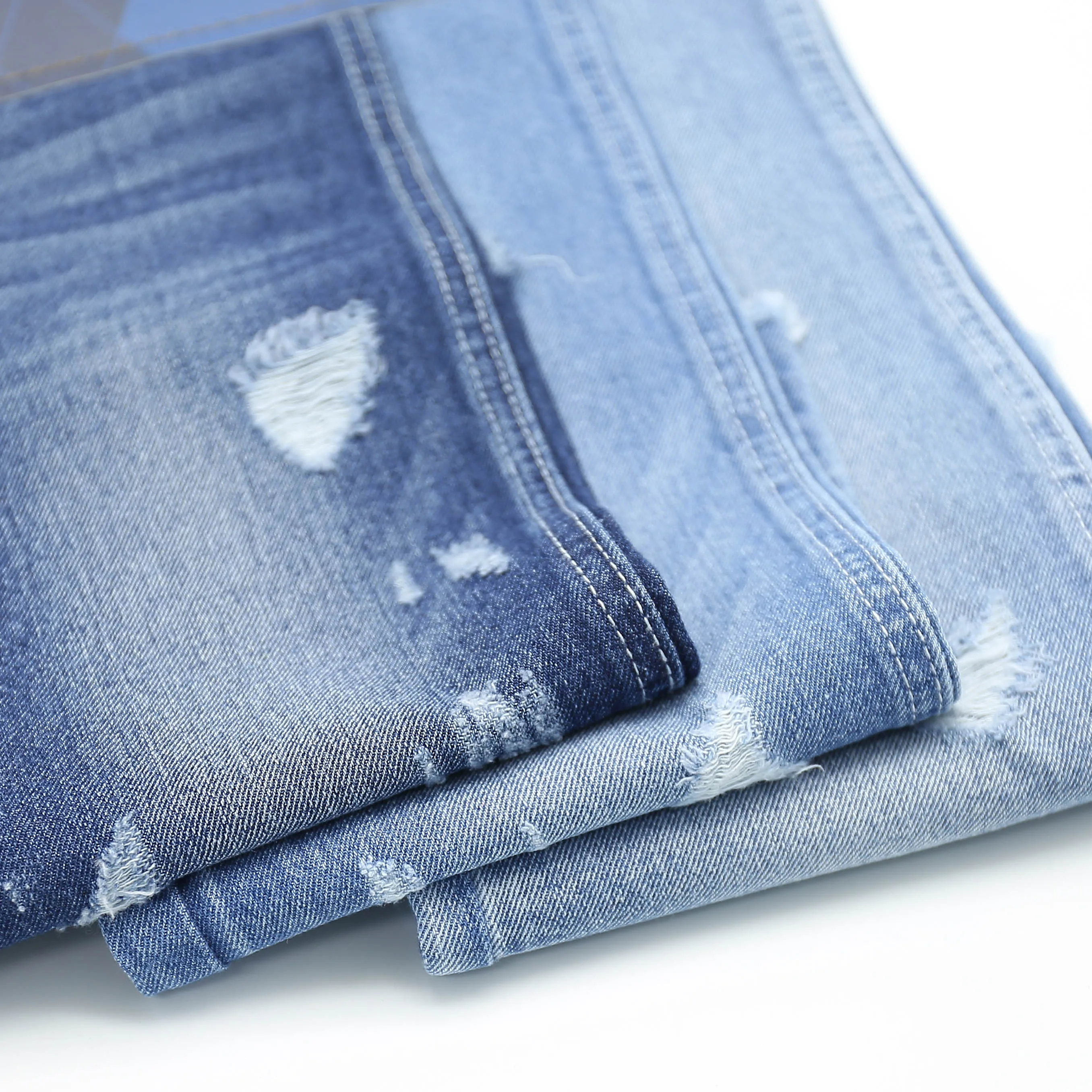 Customised Wholesale Blue Bonded Ripped Denim Fabric Per Roll