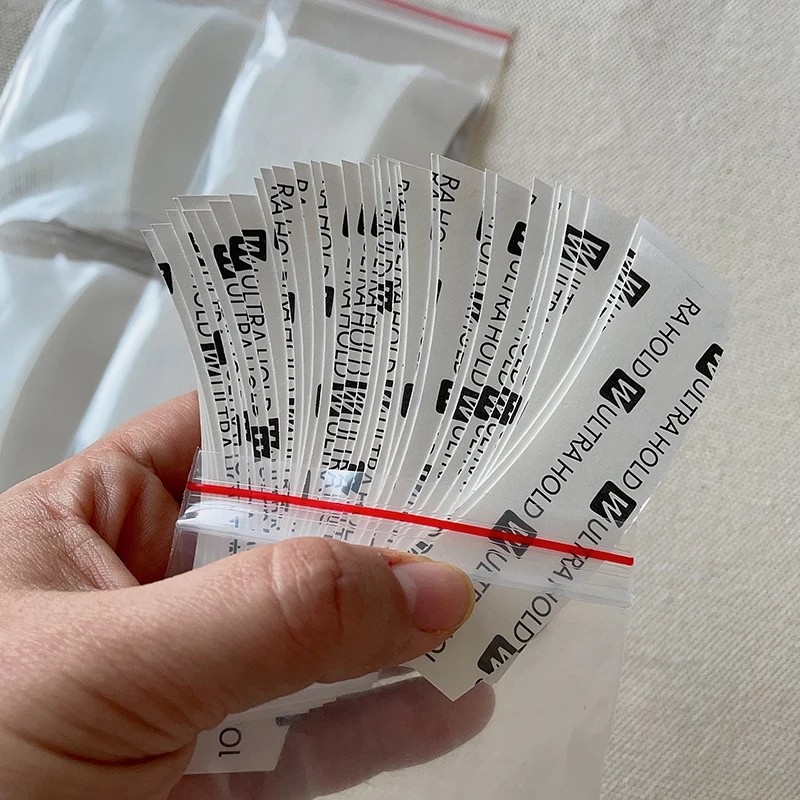wholesale price Strong Ultra Hold Hair System Adhesives Tape Super Strips Adhesives For Tape Extension toupee Lace Wig closure