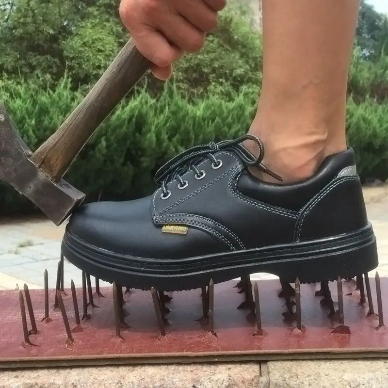 Wholesale CE Certificated Men Waterproof Non Slip Anti Vibration Steel Toe Cap Embossed Leather Industrial Safety Shoes