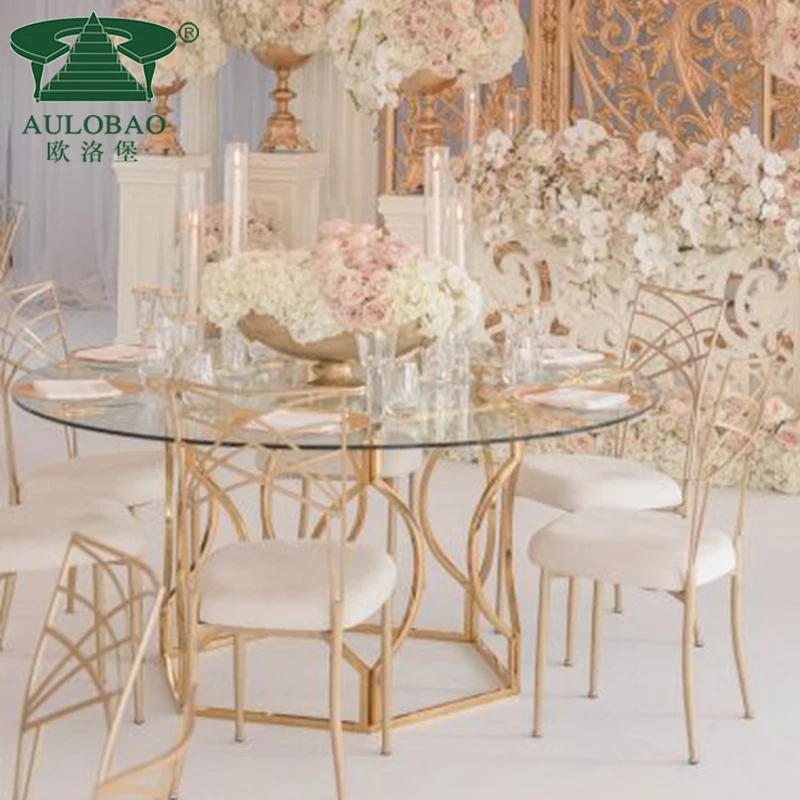 Unique round dining table with rotating centre golden base glass top dining table