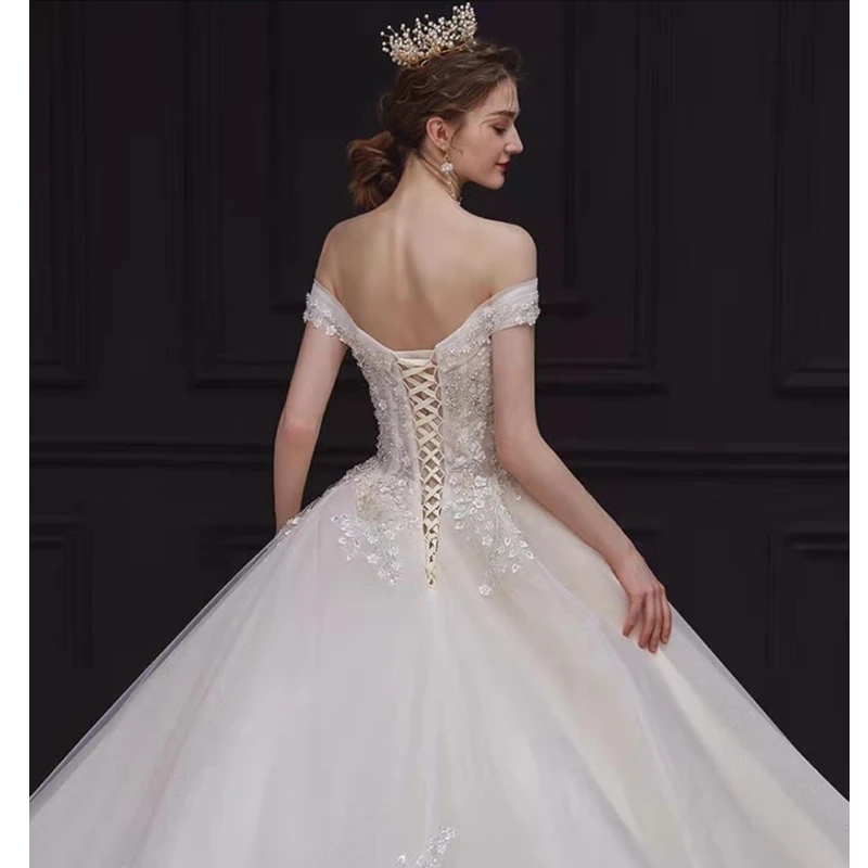 French light luxury long tail wedding dress with low neckline one shoulder with Flowers aesthetic wedding dress