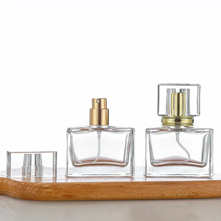 High Quality Square Transparent perfume bottle OEM 30Ml 1oz Glass Perfume Bottle With Gift Box Pump Sprayer
