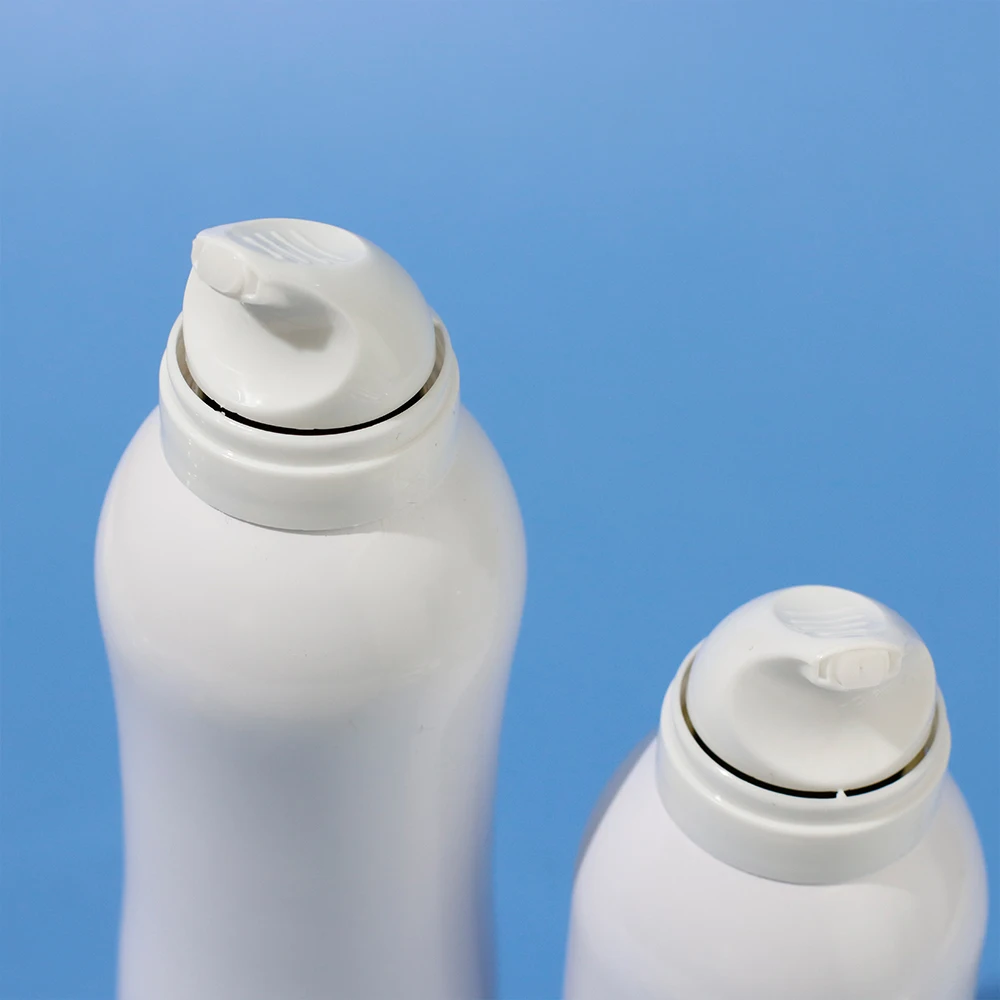 Aluminum oil can filling with pure olive oil used for cooking with olive sprayer