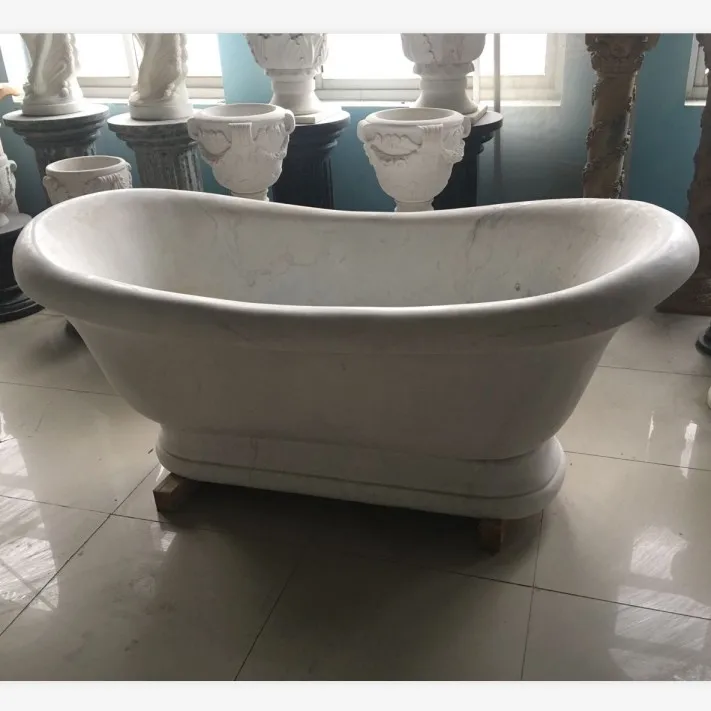 freestanding honed Nero Margiua oval marble stone bathtub