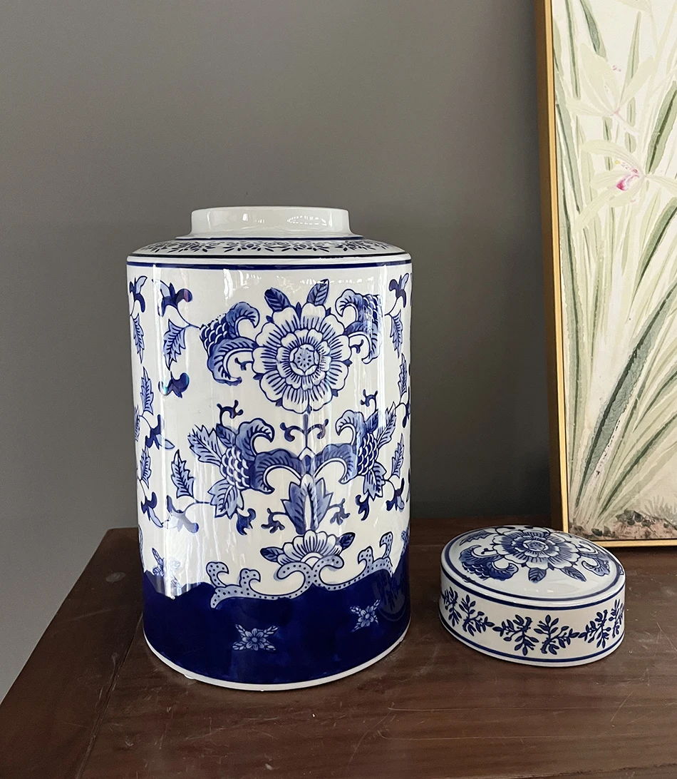 Porcelain Ginger Jar with Blue and White Peony Design A Dutch Delft blue and white baluster vase and cover