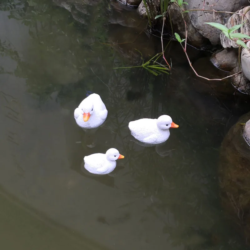 Wholesale resin figure floating pond decoration Resin Little Yellow Duck Sculpture Manufacturer Figurine Outdoor Ornaments