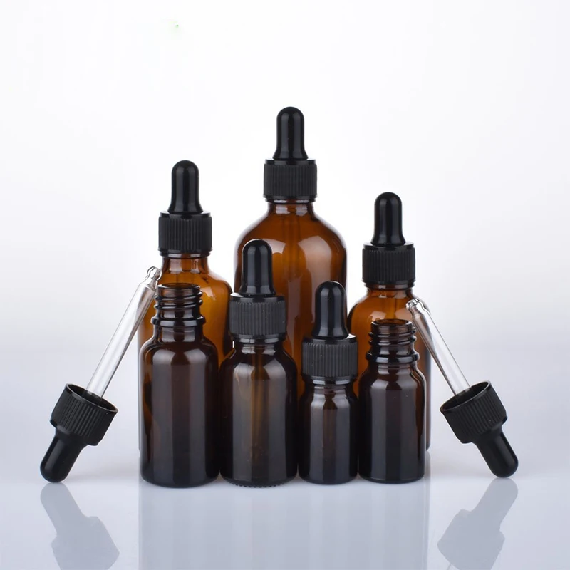 High quality hot sale latest popular 60ml 100ml colorful boston round glass bottle refillable skincare oil packaging