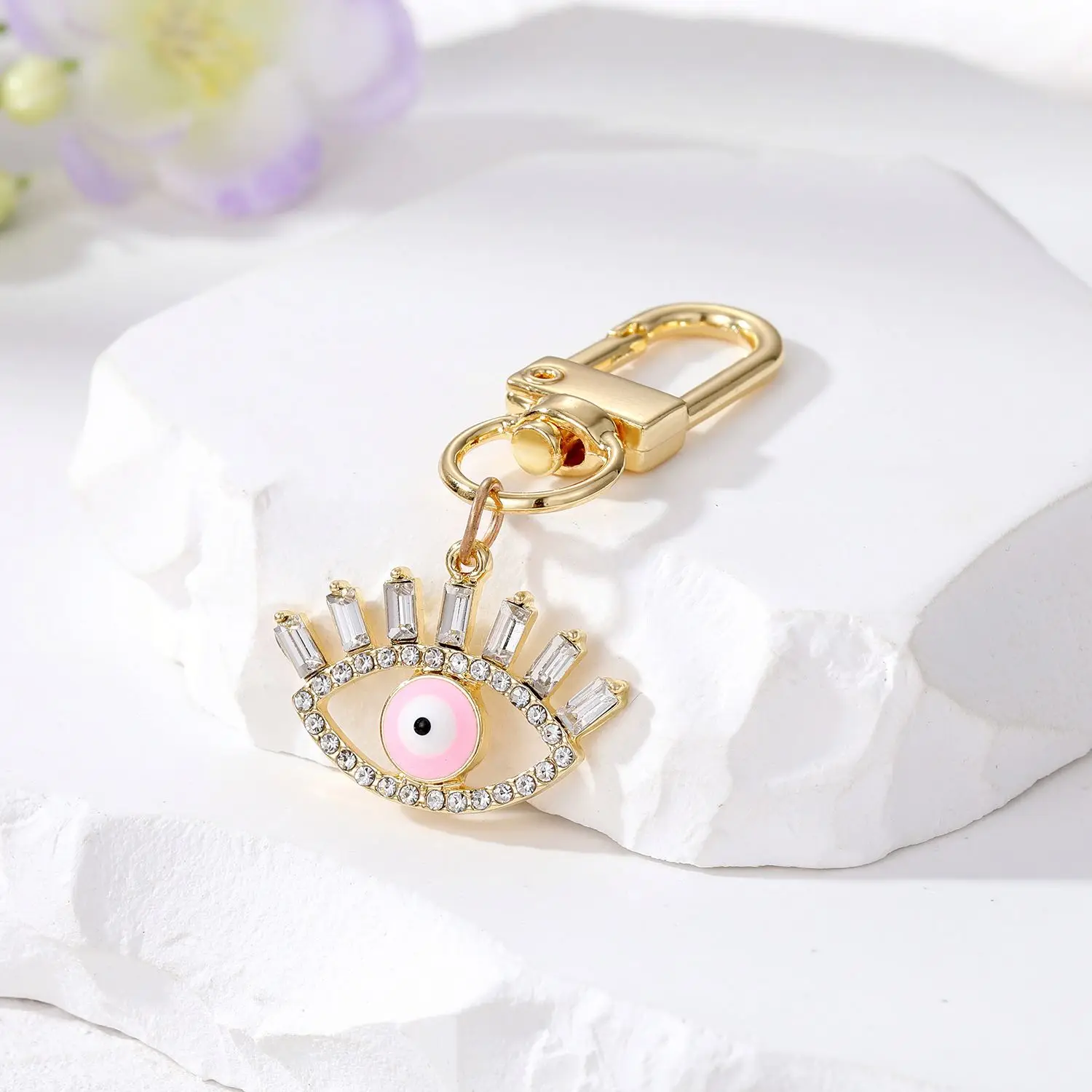 Cross-border e-commerce ornament hollow diamond eyelash eye keychain alloy geometric oil dripping Devil eye ornaments