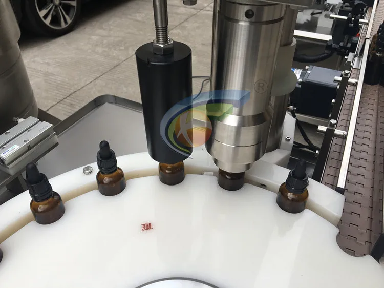 
Hot selling automatic insert dropper 10ml 30ml 50ml 60ml tincture Skin care CBD oil filling machine price 