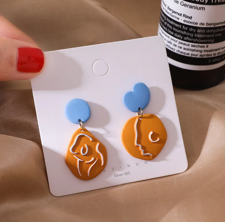 Lacquered Asymmetrical Earrings Abstract Face Shape Earclips
