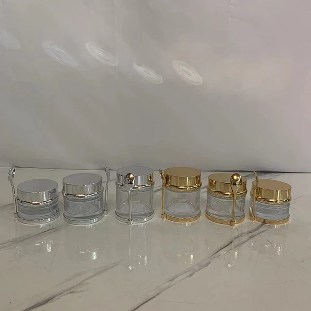 Hengjian cosmetic packaging 30g 50g 80g 30ml 50ml 80ml glass bottle luxury cosmetic face cream jar with gold silver cover spoon