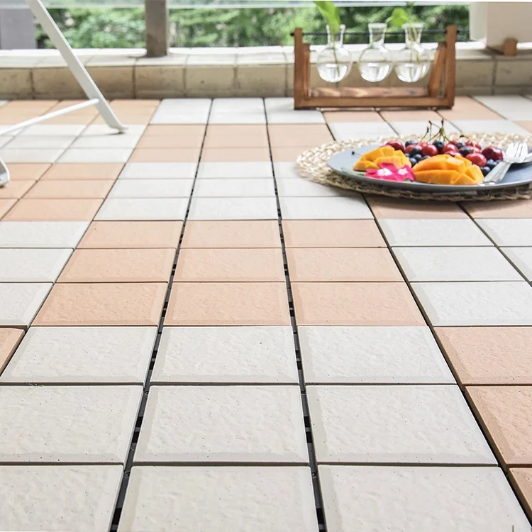 
Chinese manufacturer wholesale 12X12 garden DIY ceramic waterproof outdoor interlocking deck floor tile 