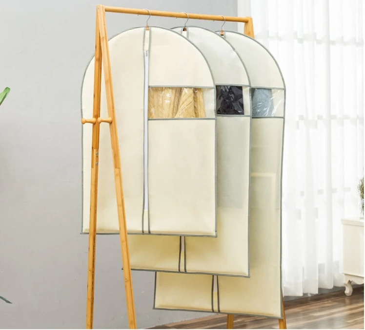 Wholesale of popular nonwoven transparent window dustproof clothing covers,coat and suit covers,fur coat storage hanging pockets