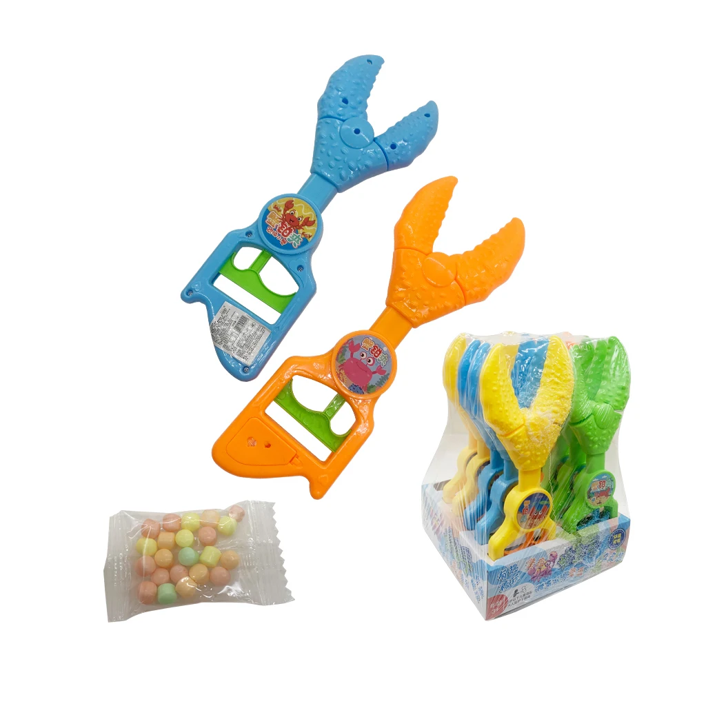 High quality funny education toy grabber crab hand plastic candy toy with hard candy for kids