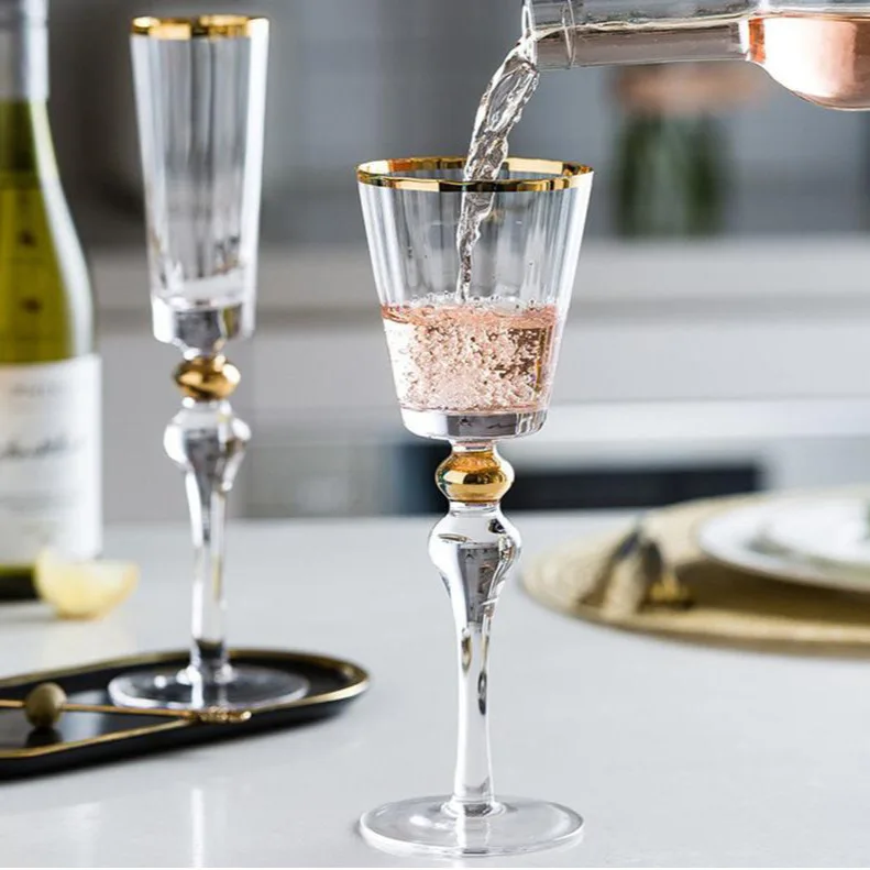Crystal high ending hand made wine and champagne glasses with pattern design and golden rim and stem daily production items