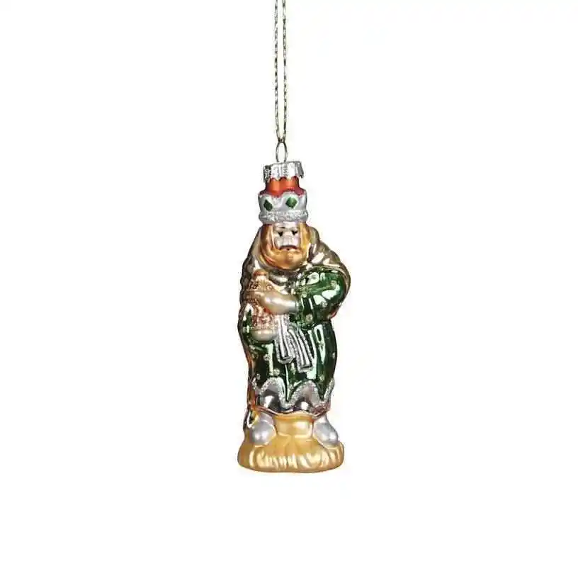 santa heads on the surface of glass christmas tree ornaments