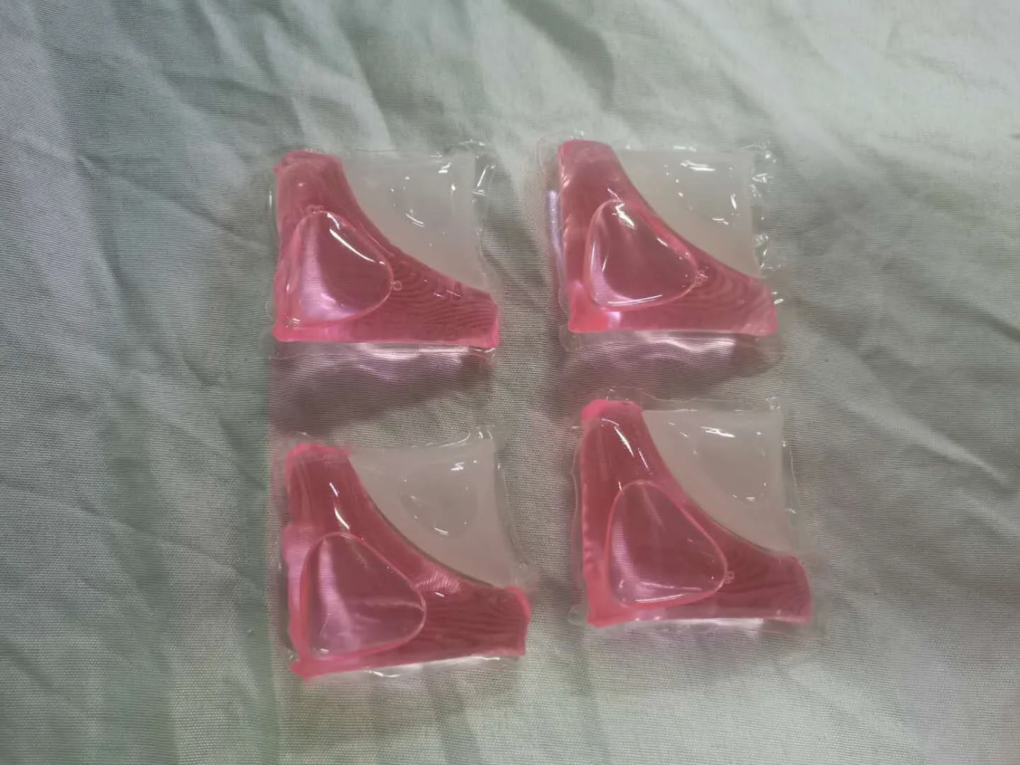 Капсулы для стирки с низким содержанием пены, жидкое моющее средство