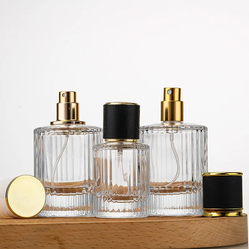 Hot Sale Luxury Cylinder Vertical Stripes Empty Perfume Bottle 30ml Transparent Glass Perfume Bottle