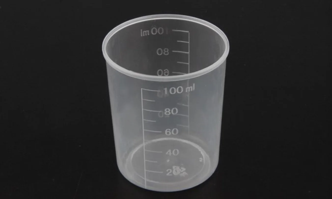 Graduated clear sterile plastic measuring disposable medicine cups