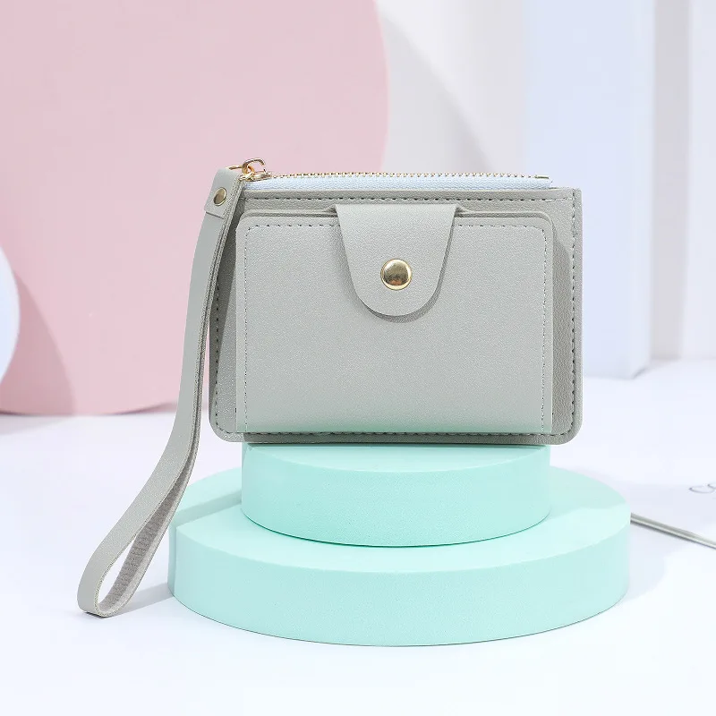 Manufacturer coin purse solid color mini change bag card change pouch with wrist strap