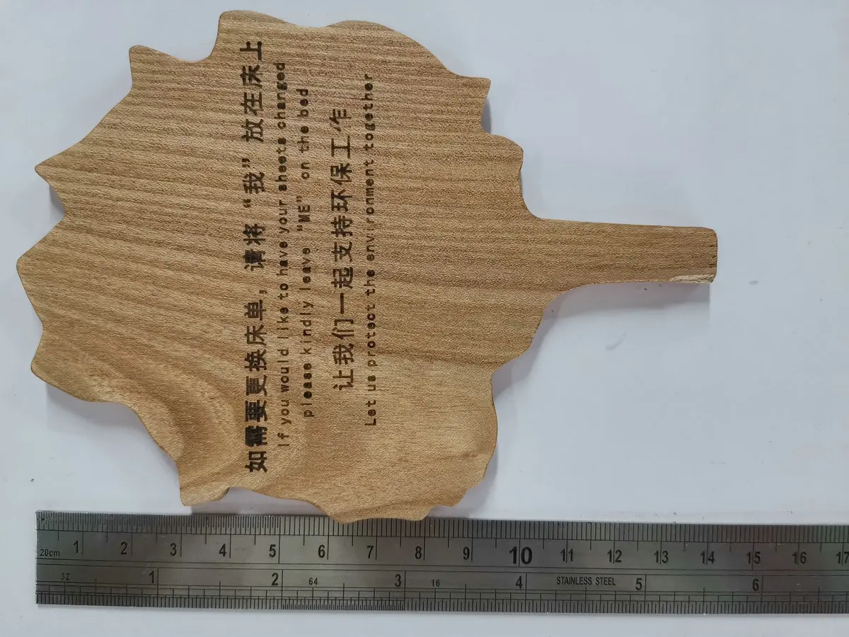 Sold Wood Hotel guest room Change bed sheets leaf shape warning sign indicator