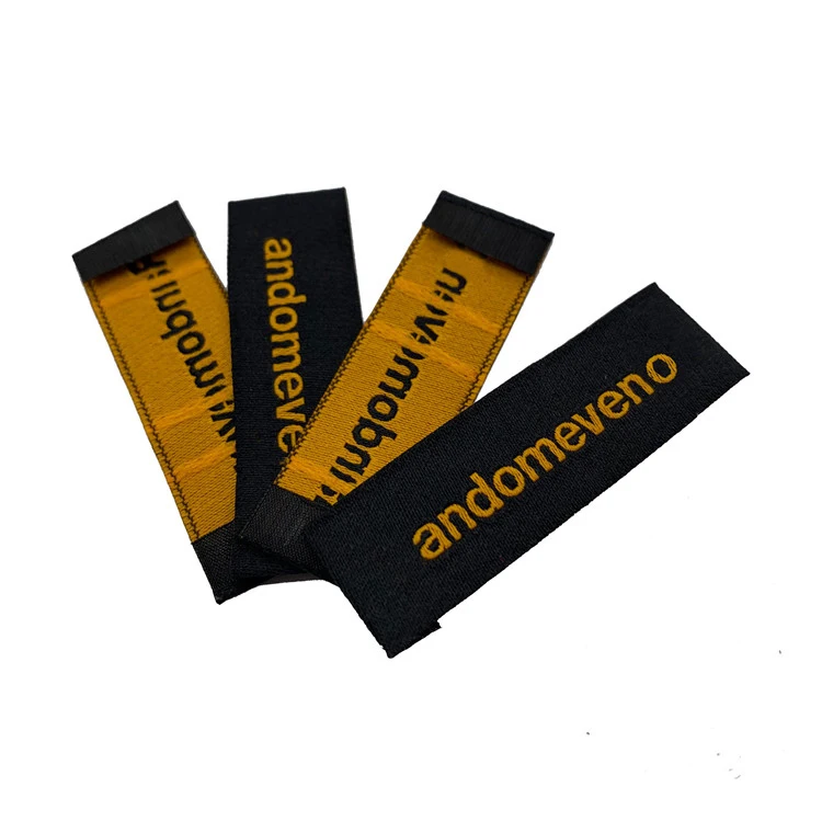 
Garment Accessories Fashion Custom Brand Name 100% Polyester Machine Woven Wash Care Labels And Neck Tags 